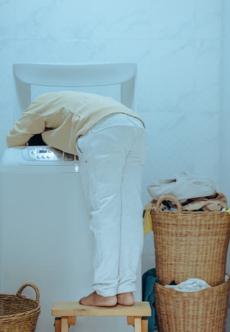 Photo enfant avec un lave linge d'occasion 